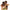 Man hugging his girlfriend while holding a box of Bars Over Bottles curly hair products gift set as a surprise gift